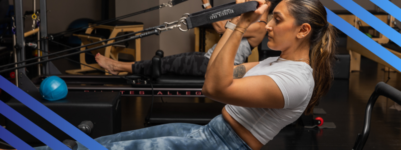 Slider Revolution – Pilates Woman doing Pilates workout at Gym in Herndon Virginia